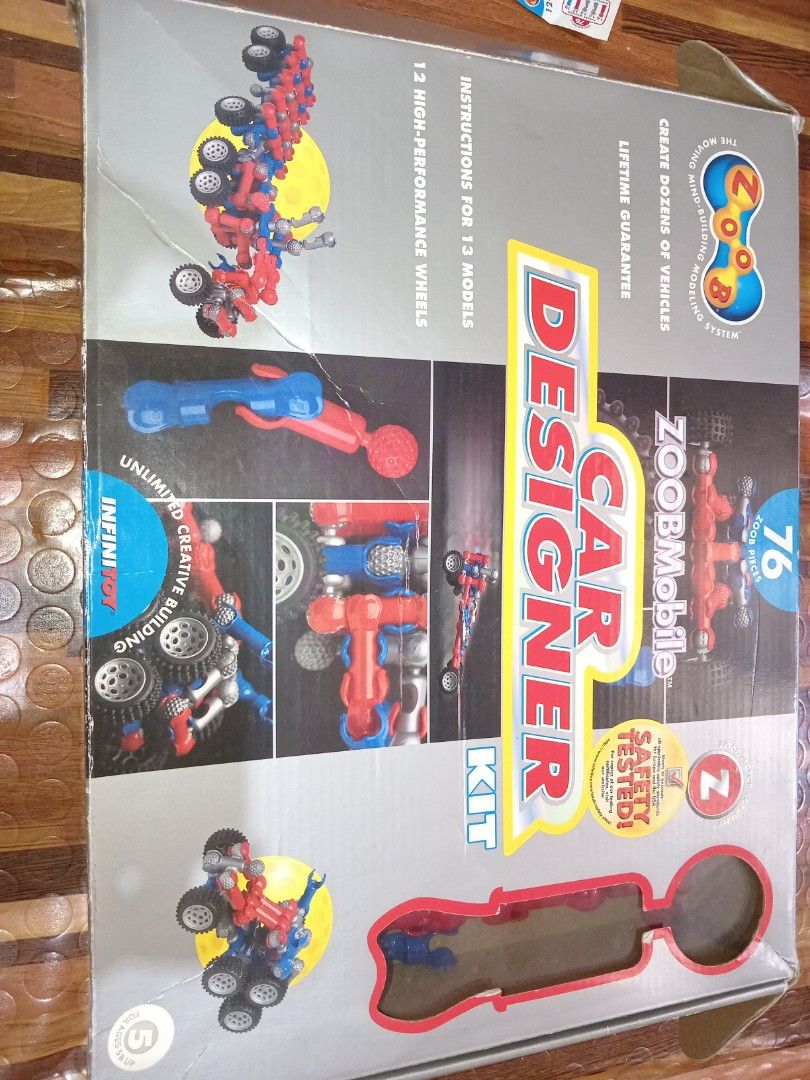 Zoob Car Designer Kit (Category: Vehicle & Diecast Models) located in Mabalacat. Submitted by kencloset (Listing ID 1439286491, Image 2). Description: - Zoob Car Designer Kit - Includes 76 Zoob pieces - 12 high-performance wheels - Instructions for 13 models - Build dozens of vehicles - Includes 4 bonus jumbo vehicles - Comes with three instruction guides - Box shows some wear.
