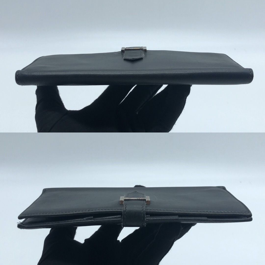 267004673 HERMES SLG BEARN BLACK (Category: Luxury Bags & Wallets) located in Taguig. Submitted by ecoring.ph (Listing ID 1439458758, Image 3). Description: ◆CONDITION: BC ◆DESCRIPTIONS: (Other defects/info:) OUTER: The body of the wallet is scratched, scuffed, stained, and dirty, and has press marks and wrinkles, and shows signs of use. The rubber lining and edges of the wallet are scratched, scuffed, stained, and dirty, and have press marks, cr