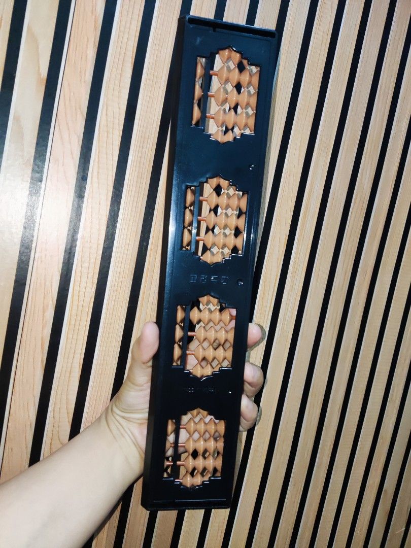 Abacus with Brown Beads (Category: Educational & Learning Toys) located in Pateros City. Submitted by starry__night__20951 (Listing ID 1439531694, Image 2). Description: - Classic abacus with brown beads and a black frame. - All beads are present and movable. - Ideal for learning math and performing calculations. - 6.35 cm x 32 cm - made in Korea -399 only.
