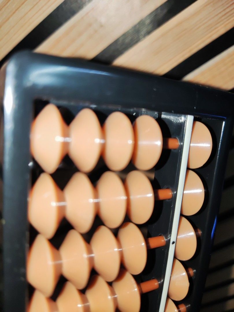 Abacus with Brown Beads (Category: Educational & Learning Toys) located in Pateros City. Submitted by starry__night__20951 (Listing ID 1439531694, Image 3). Description: - Classic abacus with brown beads and a black frame. - All beads are present and movable. - Ideal for learning math and performing calculations. - 6.35 cm x 32 cm - made in Korea -399 only.