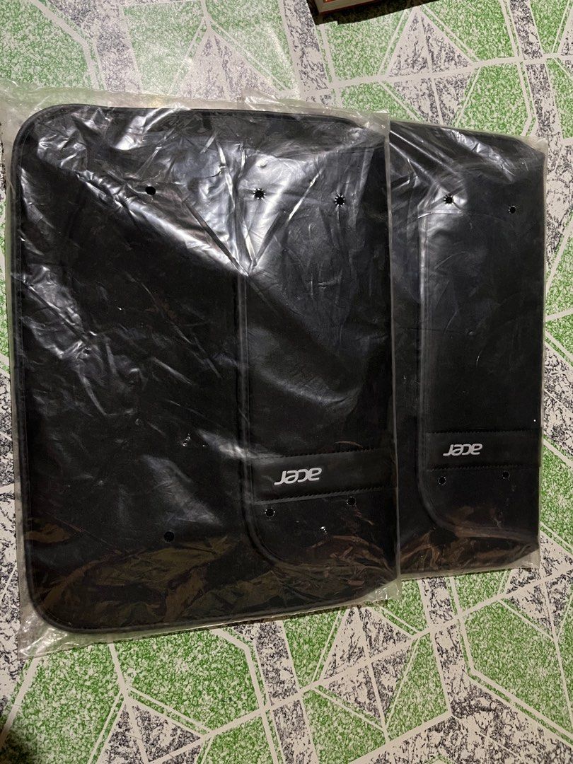 Acer Laptop Sleeve (Category: Laptop Bags & Sleeves) located in Taguig. Submitted by mranmencoal (Listing ID 1439502800, Image 1). Description: - Brand new Acer laptop sleeves. - Color: Black - Material: Leather-like - Features the Acer logo. - Still in original packaging. - TAKE ALL 300.