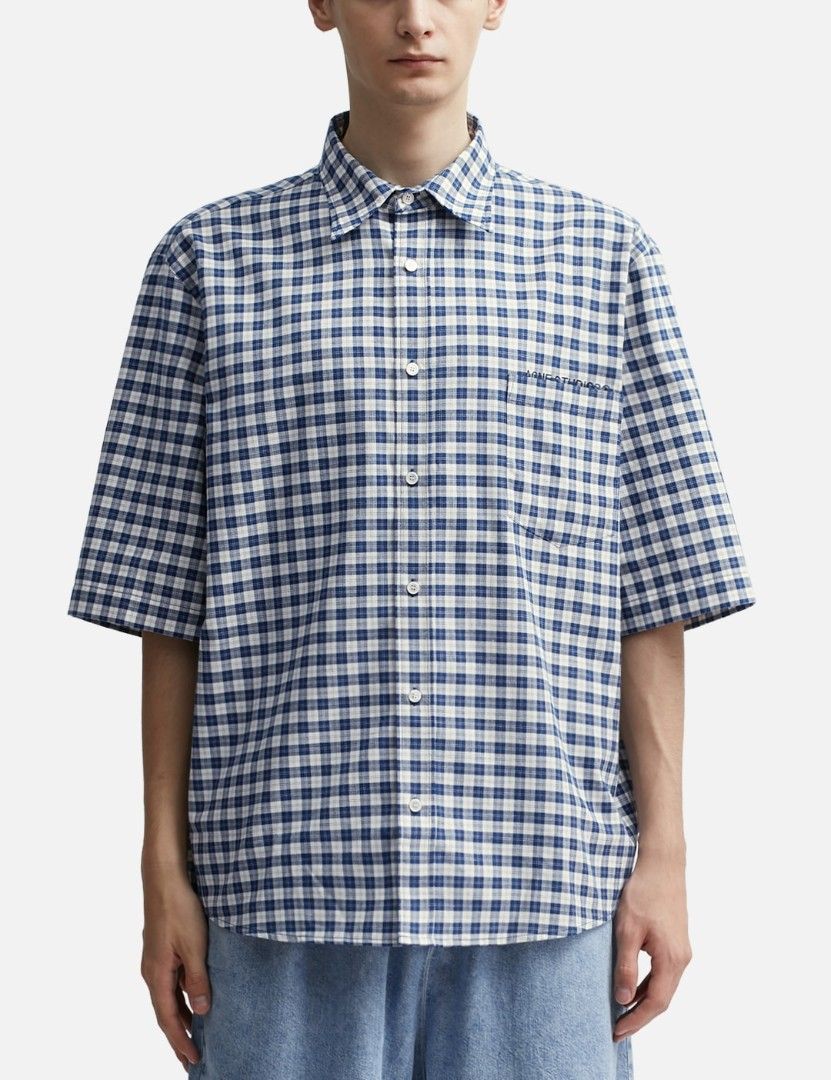 Acne Studios Gingham Short Sleeve Shirt (Category: Tshirts & Polo Shirts ) located in Manila. Submitted by connor____lee (Listing ID 1439573435, Image 1). Description: - Acne Studios short sleeve shirt - Blue and white gingham pattern - Button-down closure - Chest pocket - Classic collar - Short sleeves - Relaxed fit ✨ Authentic ✨.