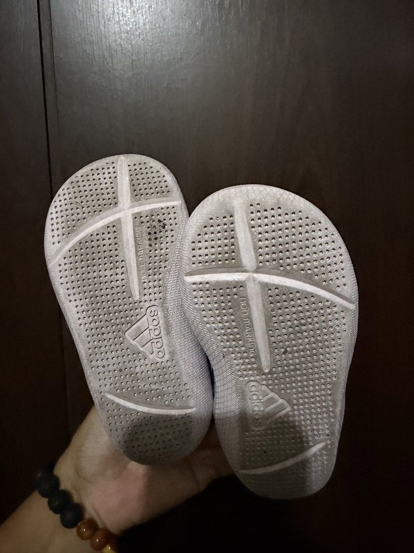 Adidas AltaVenture 3.1 Sandals (Category: Babies & Kids Fashion) located in Mandaluyong City. Submitted by jenvm (Listing ID 1439495309, Image 3). Description: Adidas AltaVenture 3.1 sandals. Features a mesh upper and adjustable straps. The sandals are in a light color scheme with blue and mint green accents. The soles have the Adidas logo and are designed for grip. The original price tag is still attached, showing the price in PHP..
