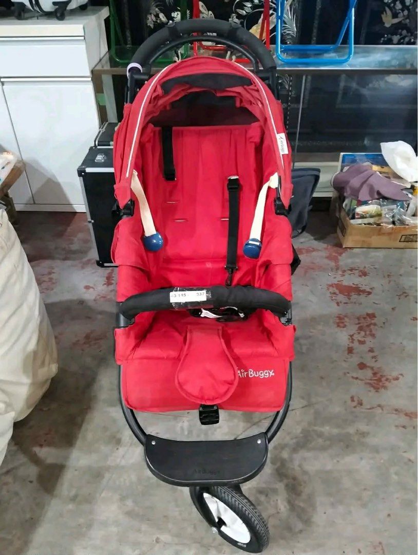 Air Buggy Stroller (Category: Strollers) located in Calamba. Submitted by rhiajapansurplus-babystuff-03 (Listing ID 1439549315, Image 1). Description: - Red Air Buggy stroller - Black handlebar and footrest - Includes canopy and safety straps - Single front wheel, two rear wheels - Padded seat for comfort - Easy to maneuver.