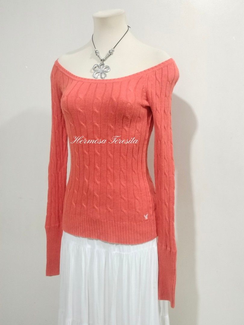 American Eagle Orange Off-Shoulder or Boat Neck Cable Knit Body Fitted Full Length Longsleeve Sweater / Bella Swan Elena Gilbert / Y2K 90s 2000s (Category: Longsleeves) located in Cavite. Submitted by hermosateresitaph (Listing ID 1439540245, Image 3). Description: ♡ xs on tag (can fit xs to small) - semi stretch ♡ cable knit ♡ wide neckline - boat neck or off shoulder style ♡ american eagle embroidered logo sa bottom ♡ ribbed wrist cuff / waistb