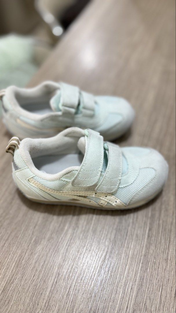 Asics Tiger Kids Shoes (Category: Babies & Kids Fashion) located in Manila. Submitted by ishiki.mnld (Listing ID 1439473667, Image 1). Description: - Onitsuka Tiger kids shoes - Color: Light blue - Size: 17.0 cm (US K9.5) - Easy wear with two velcro straps - Upper: Mesh and suede - Soles and lining: White - Made in Vietnam.