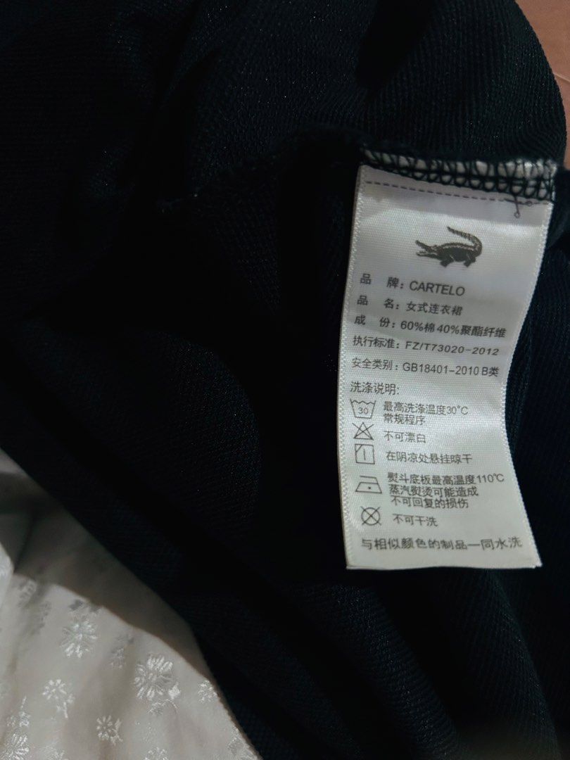 Auth cartelo polo dress (Category: Dresses) located in Bauang. Submitted by alyssaaaamm (Listing ID 1439597696, Image 3). Description: black Cartelo polo shirt dress with a white-striped collar and sleeve cuffs.small-medium.