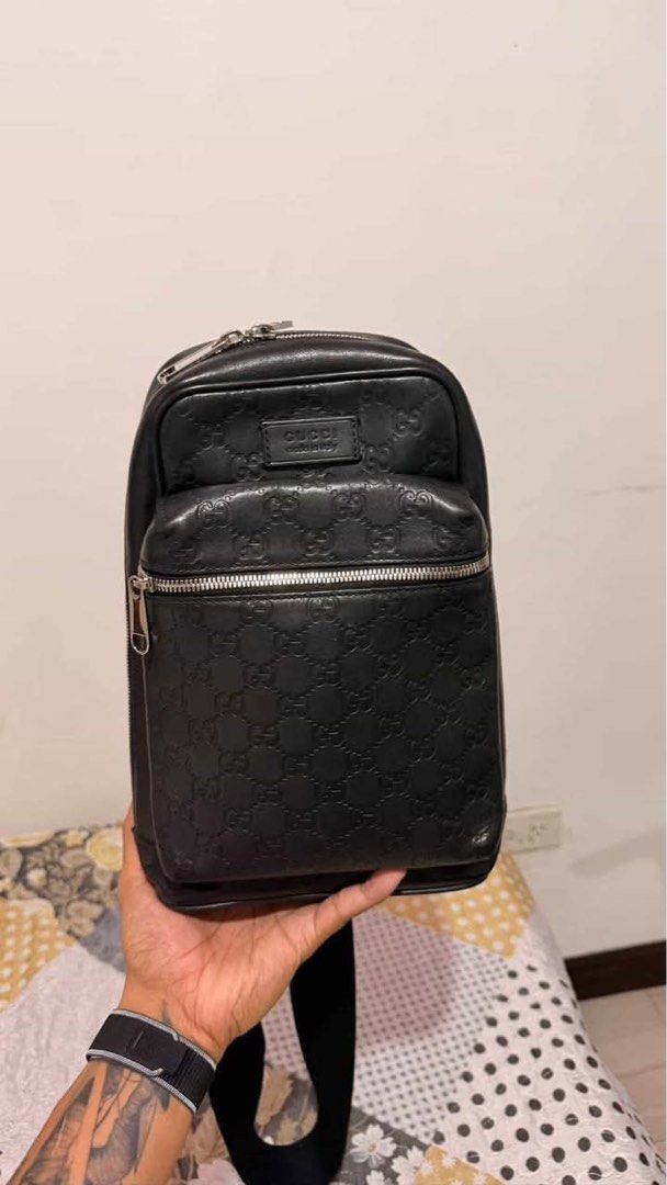 Authentic Gucci Black Guccissima all-leather mini crossbody backpack (Category: Luxury Bags & Wallets) located in Quezon City. Submitted by jiggermeister007 (Listing ID 1439598756, Image 3). Description: Authentic Gucci black Guccissima mini crossbody sling backpack with LegitGrails certificate..