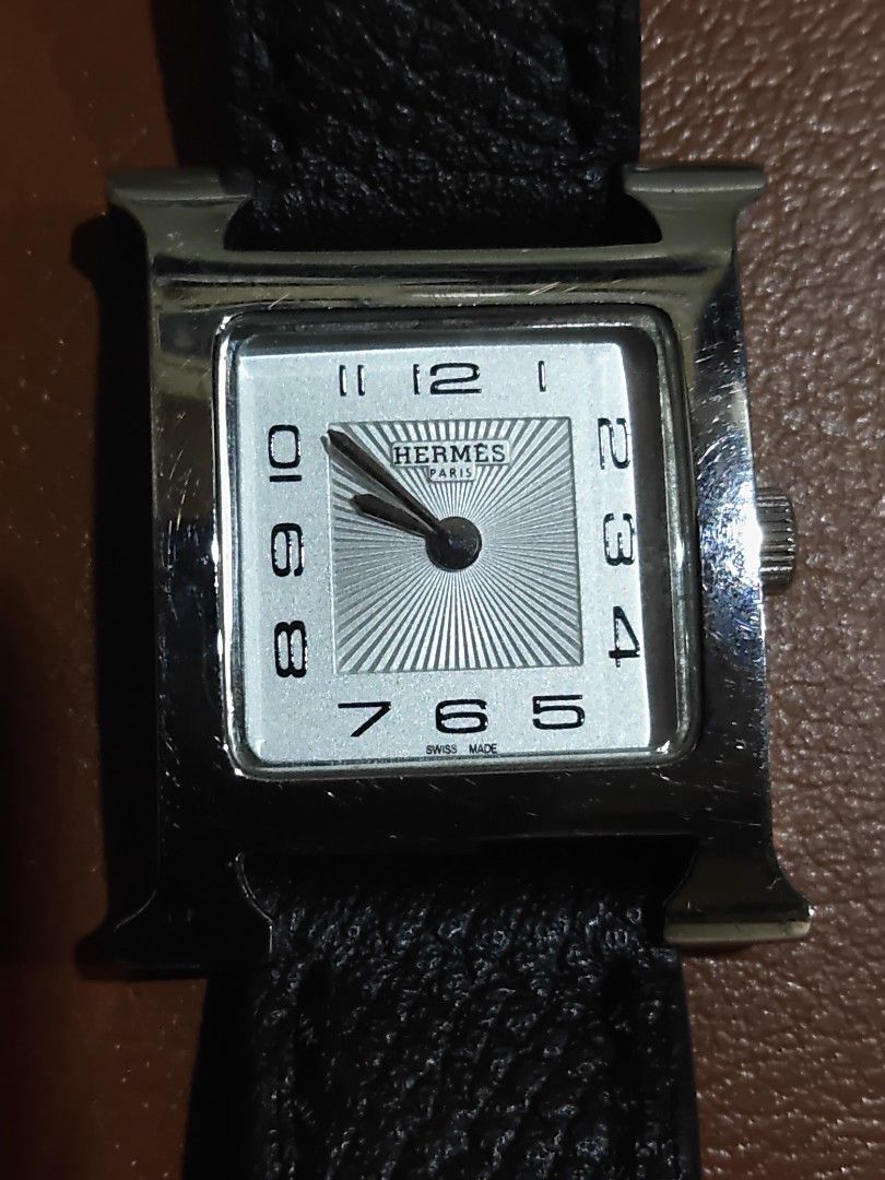 Authentic Hermes H Watch (Category: Luxury Watches) located in Manila. Submitted by hardtofindcollection (Listing ID 1439566832, Image 1). Description: - Authentic Hermes H watch - Silver dial - Black leather strap - Stainless steel case - Hermes logo on buckle and case back - Swiss made.