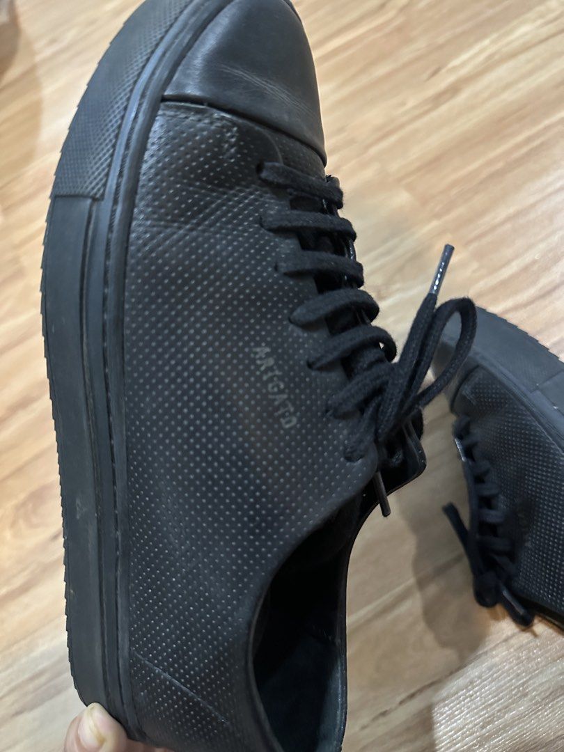 Axel Arigato Black Sneakers (Category: Sneakers) located in Quezon City. Submitted by buttercup0100 (Listing ID 1439546139, Image 2). Description: - Black Axel Arigato sneakers - Perforated design - Lace-up closure - Brand name visible - Black sole - Classic, minimalist design - bought from THE OUTNET.