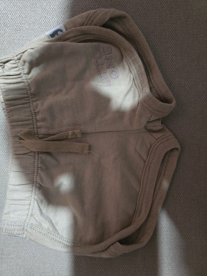 Baby Shorts (Category: Babies & Kids Fashion) located in Las Pinas. Submitted by luxeprelovedstuff (Listing ID 1439445632, Image 1). Description: - Beige baby shorts - Features "LITTLE ONE" print - Elastic waistband with drawstring - Made of soft, comfortable material - Simple, classic design - Perfect for everyday wear.