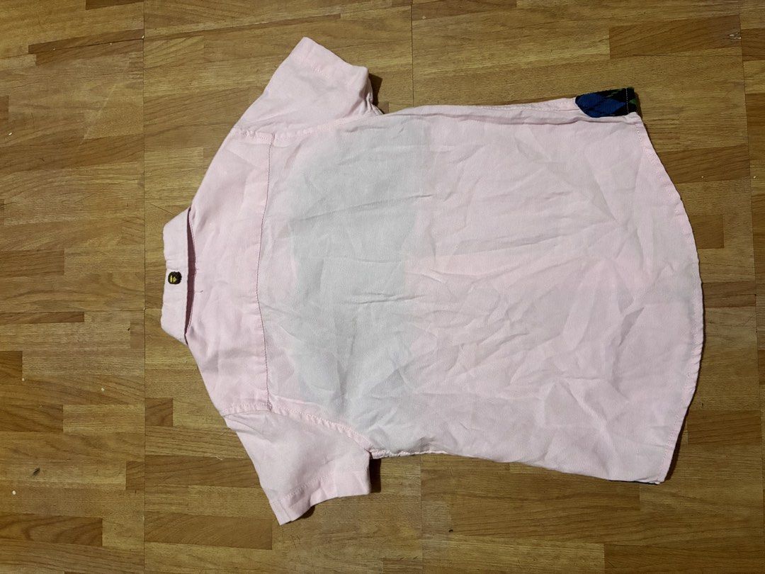 BAPE Kids Pink Argyle Shirt (Category: Babies & Kids Fashion) located in Quezon City. Submitted by grai25 (Listing ID 1439480906, Image 2). Description: - BAPE Kids shirt - Pink body - Argyle pattern chest - Short sleeves - Button-down design - Small BAPE logo on sleeve - BAPE Kids tag on collar.
