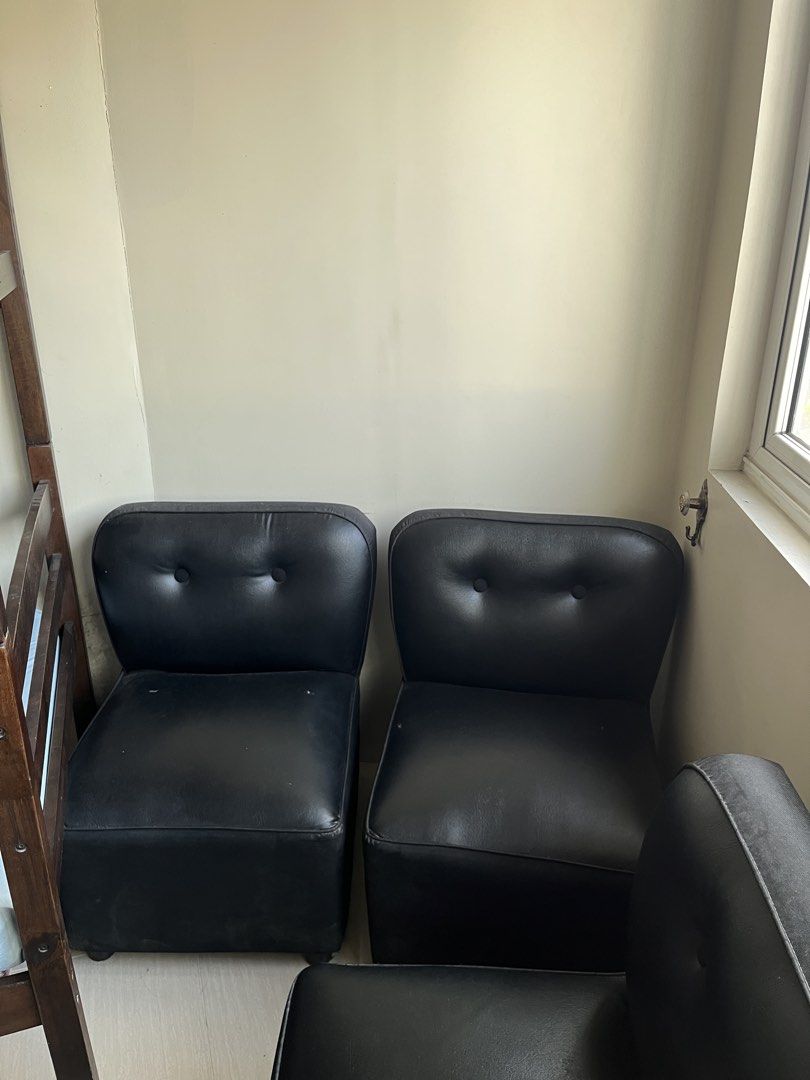 Black Leather Sofa Set (Category: Sofas) located in Manila. Submitted by keshi61 (Listing ID 1439606284, Image 2). Description: - Black leather sofa set - Includes 2-seater sofa and two single chairs - Button detailing on backrests - Modern design - Suitable for living rooms or small spaces.