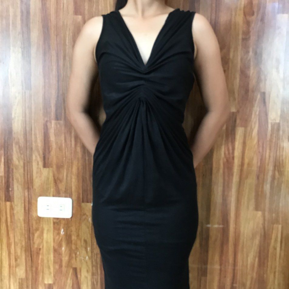 Black Sleeveless Dress (Category: Dresses) located in Tuguegarao City. Submitted by re.luv (Listing ID 1439570780, Image 2). Description: - Black sleeveless dress - V-neckline (front and back) - Ruched bust and waist detail - Knee-length - Ideal for night outs and special events.