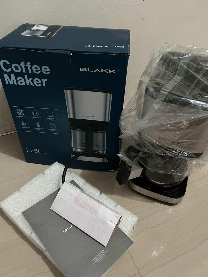 Blakk Coffee Maker KXB1T1CM 1.25L (Category: Coffee Machines & Makers) located in Lucena. Submitted by sha.lane (Listing ID 1439588978, Image 2). Description: - Brand new Blakk Coffee Maker (Dipa nagagamit with plastic pa) - negotiable - 1.25L capacity - Sleek stainless steel design - Includes original box and all accessories rfs: decluttering nakatambak lang.