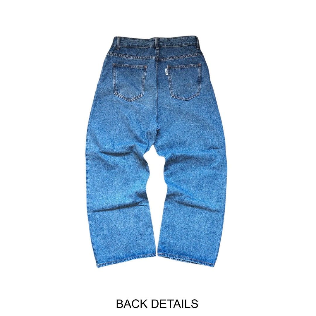 Blue Denim Wide Leg Jeans (Category: Jeans) located in Manila. Submitted by djs777 (Listing ID 1439463899, Image 2). Description: - Classic blue denim jeans - High-waisted - Wide leg opening - Waist: 32 inches - Length: 40 inches - Leg opening: 10 inches - Features back pocket details - Versatile for everyday wear.