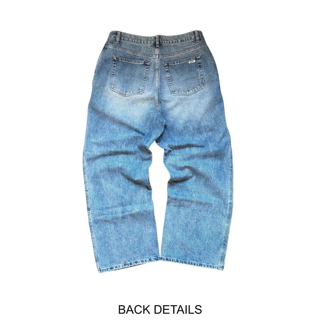 Blue Denim Wide Leg Jeans (Category: Jeans) located in Manila. Submitted by djs777 (Listing ID 1439464331, Image 2). Description: - Classic blue denim jeans - Wide leg opening - Waist: 34 inches - Length: 41 inches - Leg opening: 10 inches - See back details in the second photo - Versatile for everyday wear.
