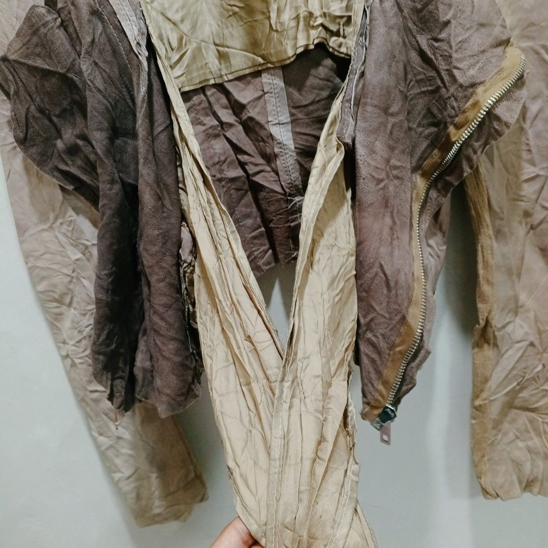 Blur Cropped Leather Jacket (Category: Coats, Jackets and Outerwear) located in Dagupan City. Submitted by youngthrift_ (Listing ID 1439514892, Image 3). Description: Size: 42 on tag width: 17.5 length: 19 Shoulder: 15 Sleeve: 25.5 Issue: None (Colors may vary due to lighting) Condition: 10/10 (Excellent) free shipping - Stylish cropped leather jacket - Asymmetrical design with zipper details - Features tie closures at the waist - Long sleeves - 