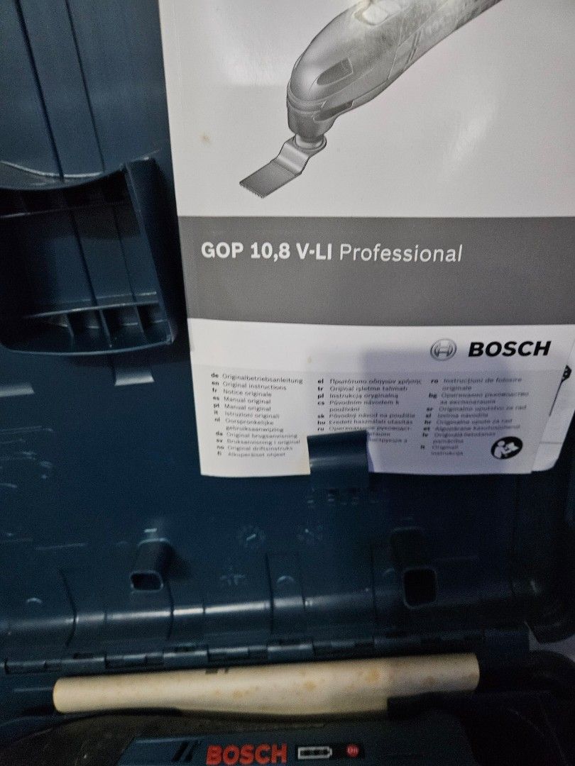 Bosch GOP 10.8 V-LI Professional oscillating Multi-Tool (Category: Construction Tools & Equipment) located in Taguig. Submitted by gowilliam.767 (Listing ID 1439539202, Image 2). Description: - Bosch GOP 10.8 V-LI Professional multi-tool - Includes charger and 4 accessories - Original manual included - Comes in a blue carrying case - Tool color: Blue and black - Charger color: Gray with Bosch logo - only 1 10.8 battery included.