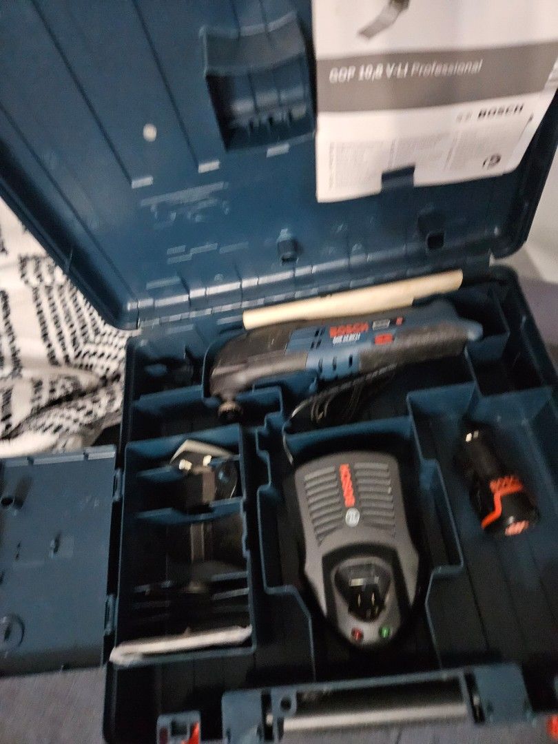 Bosch GOP 10.8 V-LI Professional oscillating Multi-Tool (Category: Construction Tools & Equipment) located in Taguig. Submitted by gowilliam.767 (Listing ID 1439539202, Image 1). Description: - Bosch GOP 10.8 V-LI Professional multi-tool - Includes charger and 4 accessories - Original manual included - Comes in a blue carrying case - Tool color: Blue and black - Charger color: Gray with Bosch logo - only 1 10.8 battery included.