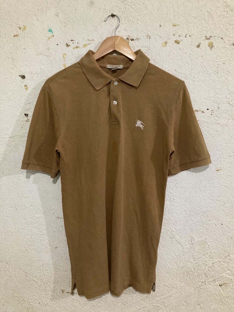 Burberry Brit Polo Shirt (Category: Shirts) located in San Jose del Monte. Submitted by zen31 (Listing ID 1439572646, Image 1). Description: BURBERRY POLO SHIRT XS ON TAG 19X29 DIMENSION VERY GOOD CONDITION 9/10 COLOR RATE ISSUE: STAINS ON FRONT.