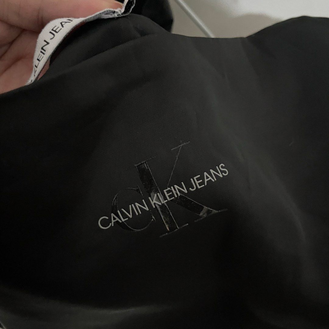 CALVIN KLEIN Jeans Black Tank Top (Category: Sleeveless) located in Leyte. Submitted by byebabies (Listing ID 1439557648, Image 3). Description: - Calvin Klein Jeans tank top - Square neckline - Thick straps - Calvin Klein Jeans logo on front - Size: S/P/CH - Made in Indonesia All items NEGOTIABLE for SAME DAY PAYMENT Do not offer 50% from its price Everything priced below 500 can be sold as bulk for 4items for 1k only Everything priced from 600-