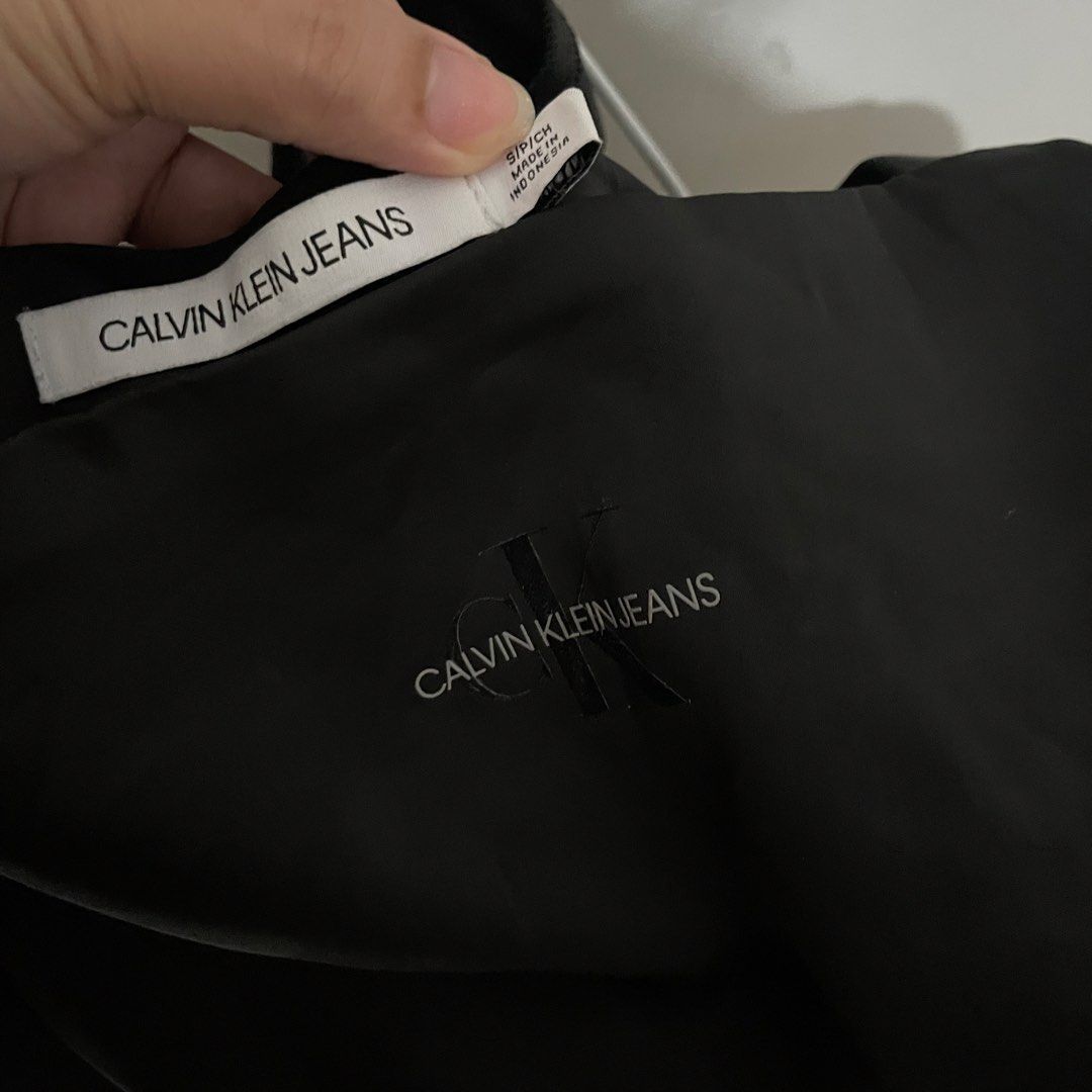 CALVIN KLEIN Jeans Black Tank Top (Category: Sleeveless) located in Leyte. Submitted by byebabies (Listing ID 1439557648, Image 2). Description: - Calvin Klein Jeans tank top - Square neckline - Thick straps - Calvin Klein Jeans logo on front - Size: S/P/CH - Made in Indonesia All items NEGOTIABLE for SAME DAY PAYMENT Do not offer 50% from its price Everything priced below 500 can be sold as bulk for 4items for 1k only Everything priced from 600-