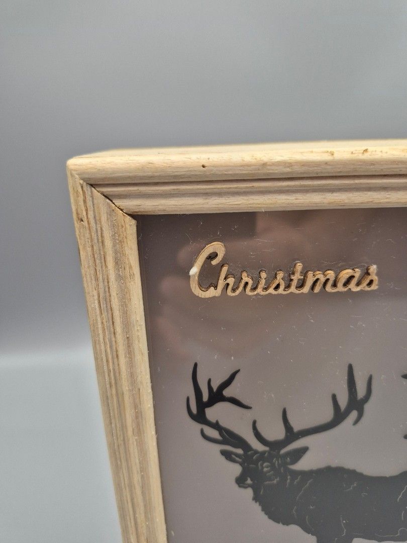 Christmas Deer LED Shadow Box Decor (Category: Frames & Pictures) located in Santa Rosa. Submitted by thesecondshelf (Listing ID 1439590335, Image 3). Description: Christmas Deer LED Shadow Box Decor Price: ₱650 • LED lighted Christmas wall decor • Rustic wooden shadow box • Deer and pine tree silhouette design • Warm cozy light • Wall mount or tabletop display • Approx. 20 x 20 cm • Battery operated • Good condition, lights working Perfect for: 
