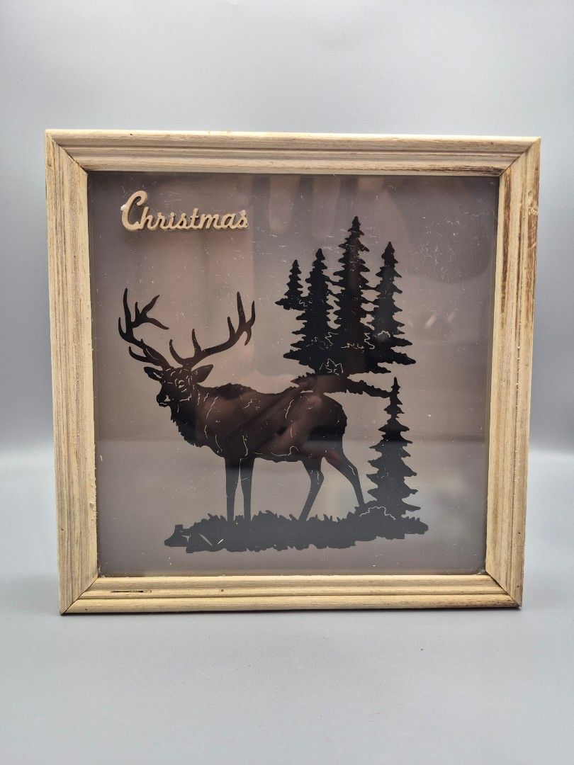 Christmas Deer LED Shadow Box Decor (Category: Frames & Pictures) located in Santa Rosa. Submitted by thesecondshelf (Listing ID 1439590335, Image 2). Description: Christmas Deer LED Shadow Box Decor Price: ₱650 • LED lighted Christmas wall decor • Rustic wooden shadow box • Deer and pine tree silhouette design • Warm cozy light • Wall mount or tabletop display • Approx. 20 x 20 cm • Battery operated • Good condition, lights working Perfect for: 