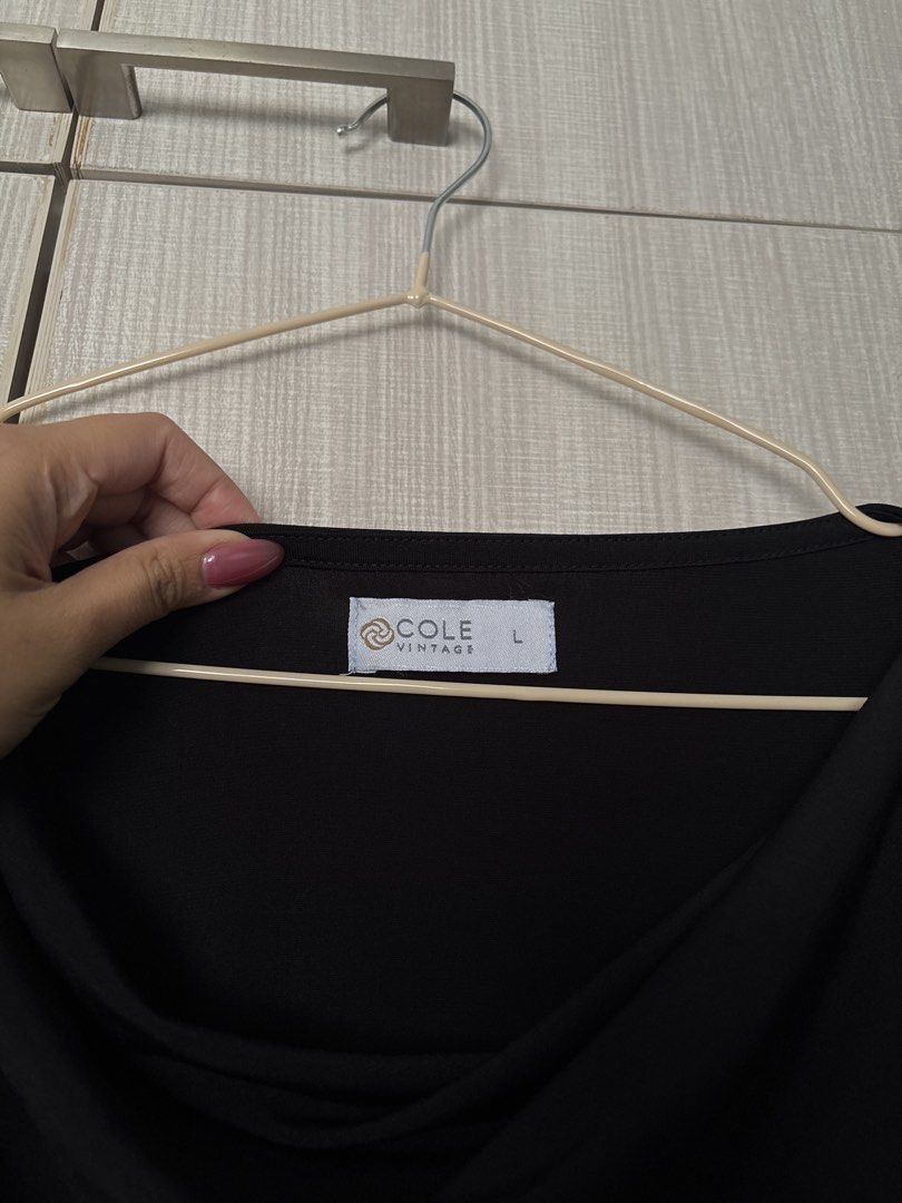 COLE VINTAGE Black Drape Dress (Category: Dresses) located in Taguig. Submitted by danammn (Listing ID 1439507312, Image 2). Description: SUPER LUXURIOUS AND BEAUTIFUL!! Lakas maka-yaman! Never used na stock lang sa cabinet. Can send when worn photo for interested buyer since di ganun ka obvious yung style on the hanger. Would keep this but way too big for me! - Cole Vintage black dress - Features a draped design - Short sleeves - Cowl neckline -