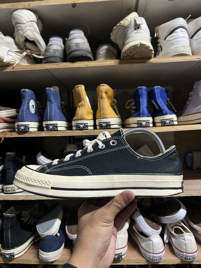 Converse Chuck 70 Low Black (Category: Sneakers) located in Manila. Submitted by thrift_ko_yan (Listing ID 1439566087, Image 2). Description: - Converse Chuck 70 Low - Color: Black canvas upper with cream toe cap and midsole - Size: US Men's 8, US Women's 10, UK 8, EUR 41.5 - White laces - Iconic Converse All Star logo.