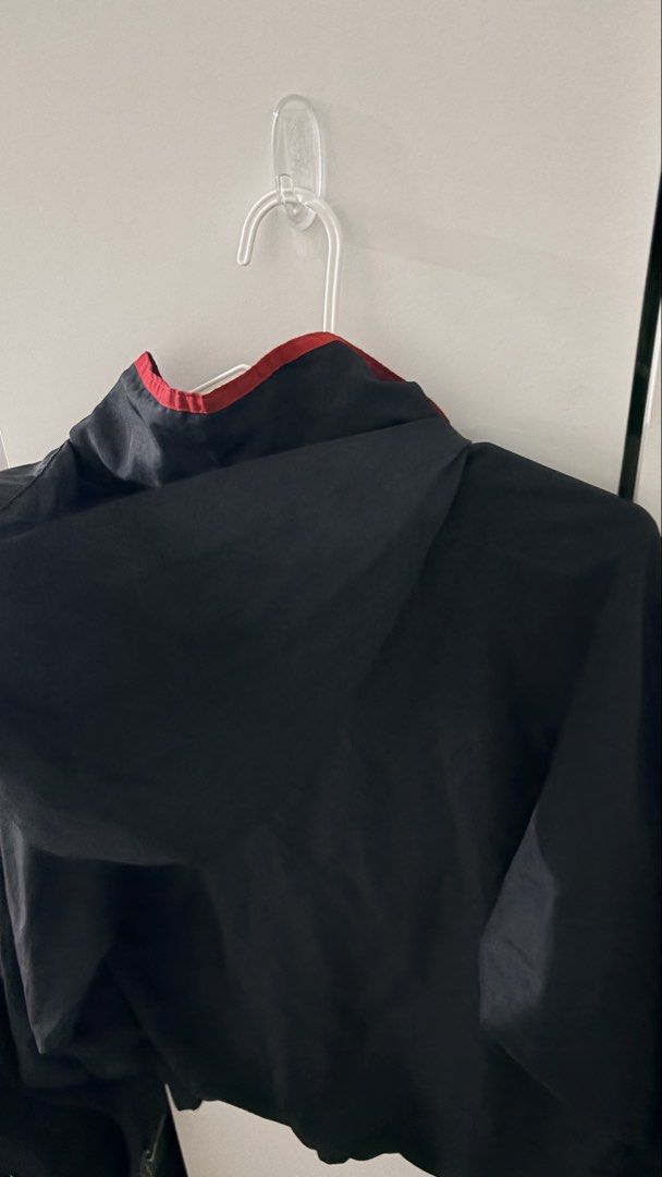 Dunlop Motorsport Jacket - Medium (Category: Coats, Jackets and Outerwear) located in Manila. Submitted by rarewhale_9a584c (Listing ID 1439548854, Image 3). Description: - Dunlop Motorsport jacket - Size: Medium - Features: - Hood - Full zipper closure - Red collar lining - Dunlop Motorsport logo on chest and zipper.