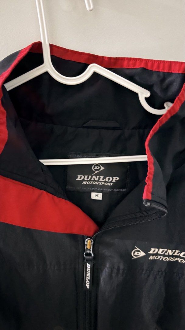 Dunlop Motorsport Jacket - Medium (Category: Coats, Jackets and Outerwear) located in Manila. Submitted by rarewhale_9a584c (Listing ID 1439548854, Image 2). Description: - Dunlop Motorsport jacket - Size: Medium - Features: - Hood - Full zipper closure - Red collar lining - Dunlop Motorsport logo on chest and zipper.