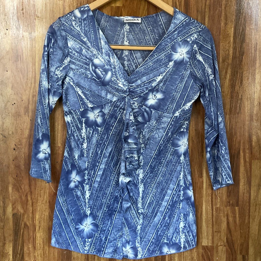 Fairycore Blue Floral Print Blouse (Category: Blouses) located in Tuguegarao City. Submitted by re.luv (Listing ID 1439573568, Image 1). Description: - Floral print blouse - Denim-like pattern - V-neckline - Three-quarter sleeves - Gathered front detail - Fitted style - Brand tag visible.