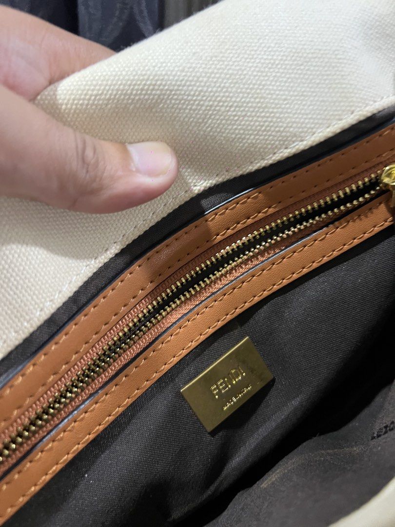 Fendi Multicolored Baguette (Category: Luxury Bags & Wallets) located in Quezon City. Submitted by just.loveclub (Listing ID 1439546085, Image 2). Description: Fendi Baguette Multicolor Canvas Bag with an embroidered FF pattern. With minimal signs of wear.