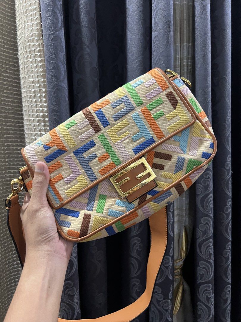 Fendi Multicolored Baguette (Category: Luxury Bags & Wallets) located in Quezon City. Submitted by just.loveclub (Listing ID 1439546085, Image 1). Description: Fendi Baguette Multicolor Canvas Bag with an embroidered FF pattern. With minimal signs of wear.
