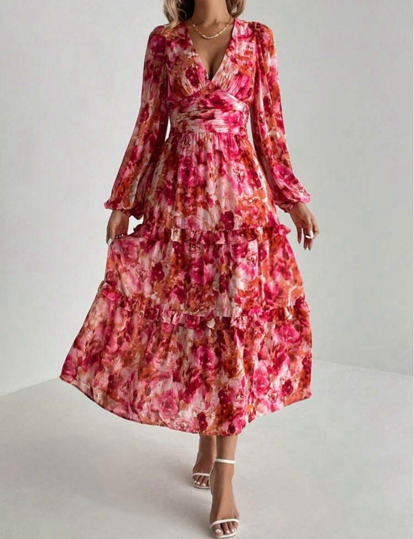 Floral Print Maxi Dress (Category: Dresses) located in Quezon City. Submitted by shop__dnce (Listing ID 1439581080, Image 3). Description: UNUSED (just washed) MEDIUM - Beautiful floral maxi dress - Vibrant pink and orange print - Flattering V-neckline - Long sleeves - Tiered skirt - Cinched waist for a defined silhouette - Ideal for special events or everyday wear.