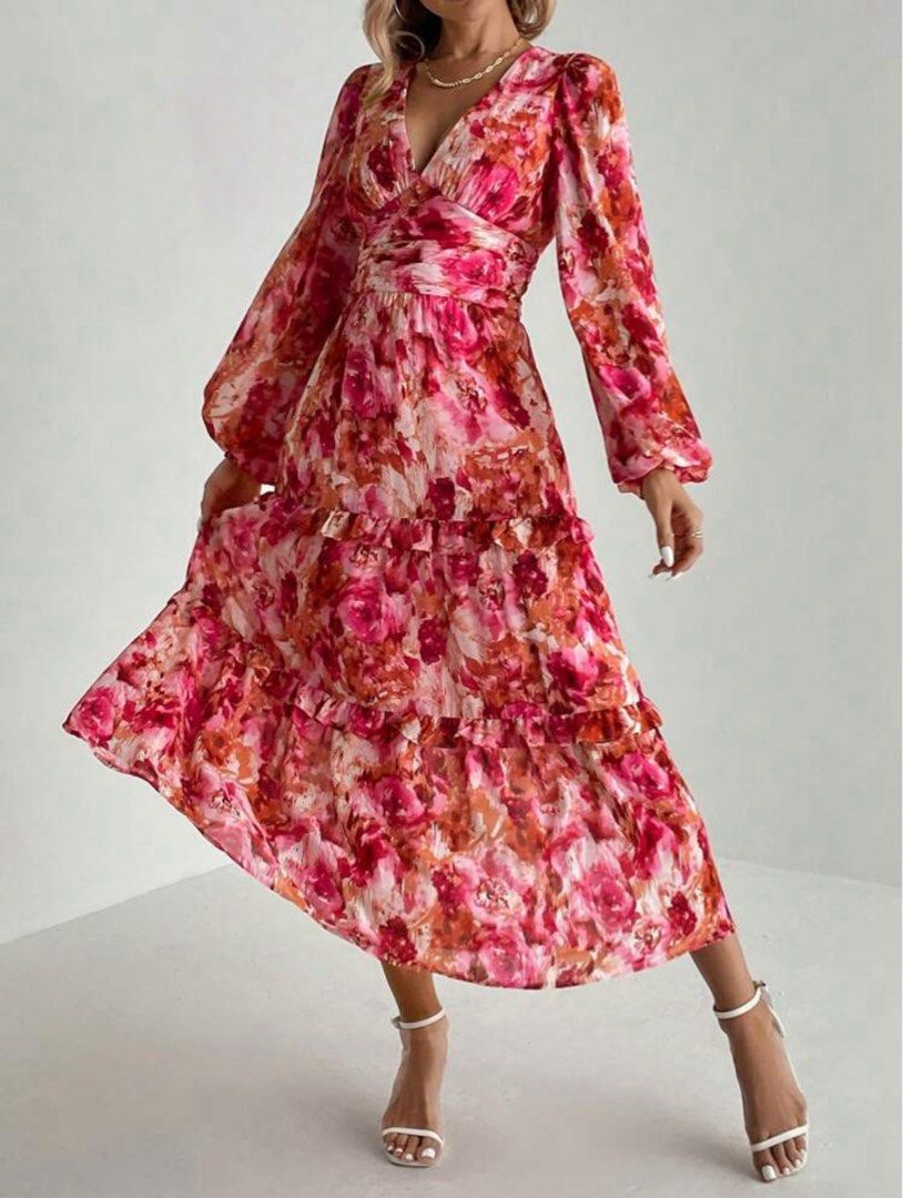 Floral Print Maxi Dress (Category: Dresses) located in Quezon City. Submitted by shop__dnce (Listing ID 1439581080, Image 1). Description: UNUSED (just washed) MEDIUM - Beautiful floral maxi dress - Vibrant pink and orange print - Flattering V-neckline - Long sleeves - Tiered skirt - Cinched waist for a defined silhouette - Ideal for special events or everyday wear.