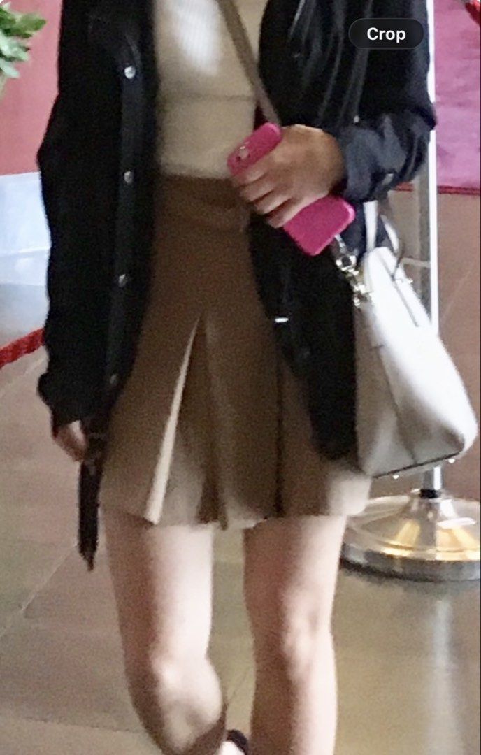Forever 21 Beige Skirt - Size S (Category: Skirts) located in Makati City. Submitted by goodfindsonly (Listing ID 1439527724, Image 3). Description: - Forever 21 beige skirt - Size: S - Features a front slit - Made in China - Classic design - Versatile for various occasions - Easy to pair with different tops and shoes.