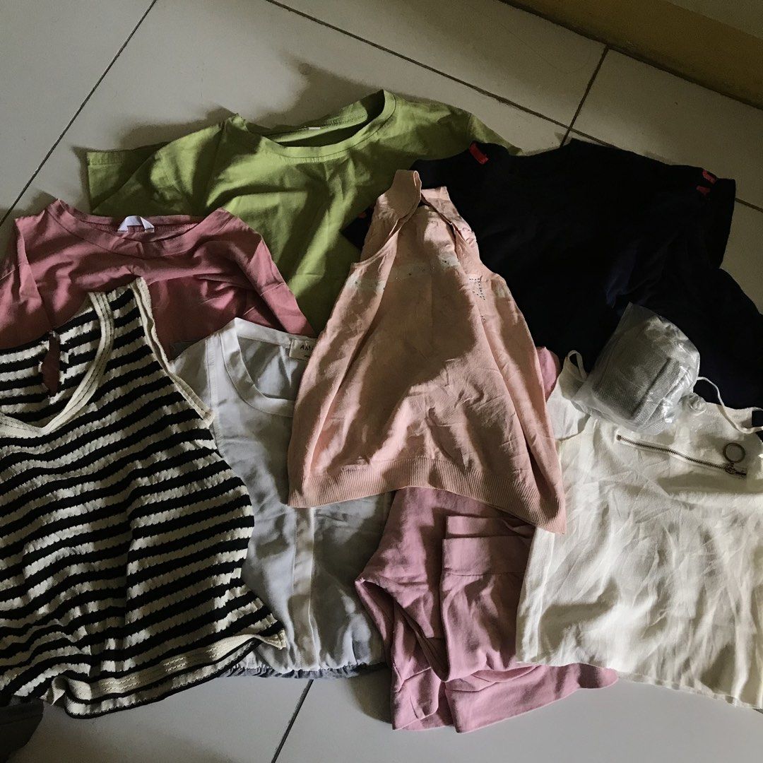 FREE 11pcs clothes (Category: Others Tops) located in Manila. Submitted by bbeeaa (Listing ID 1439490146, Image 1). Description: - thrifted; some are like new, some have minimal flaws - 10 + 1 pajama pants (not included sa photos) .