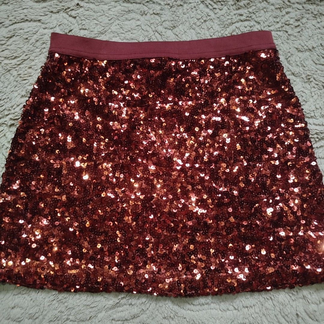 Fully Sequins Mini Skirt (Category: Skirts) located in Cebu City. Submitted by kikayavenue (Listing ID 1439525911, Image 2). Description: - Size: M on tag - WL- 26-28" (elastic waistband) - Length- 14" - fully sequins mini skirt - with inner lining - no issues/flaws.