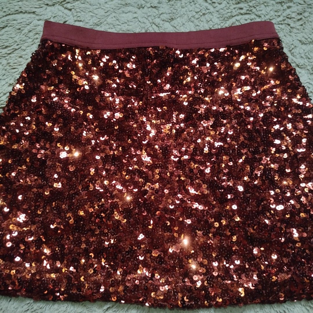 Fully Sequins Mini Skirt (Category: Skirts) located in Cebu City. Submitted by kikayavenue (Listing ID 1439525911, Image 3). Description: - Size: M on tag - WL- 26-28" (elastic waistband) - Length- 14" - fully sequins mini skirt - with inner lining - no issues/flaws.