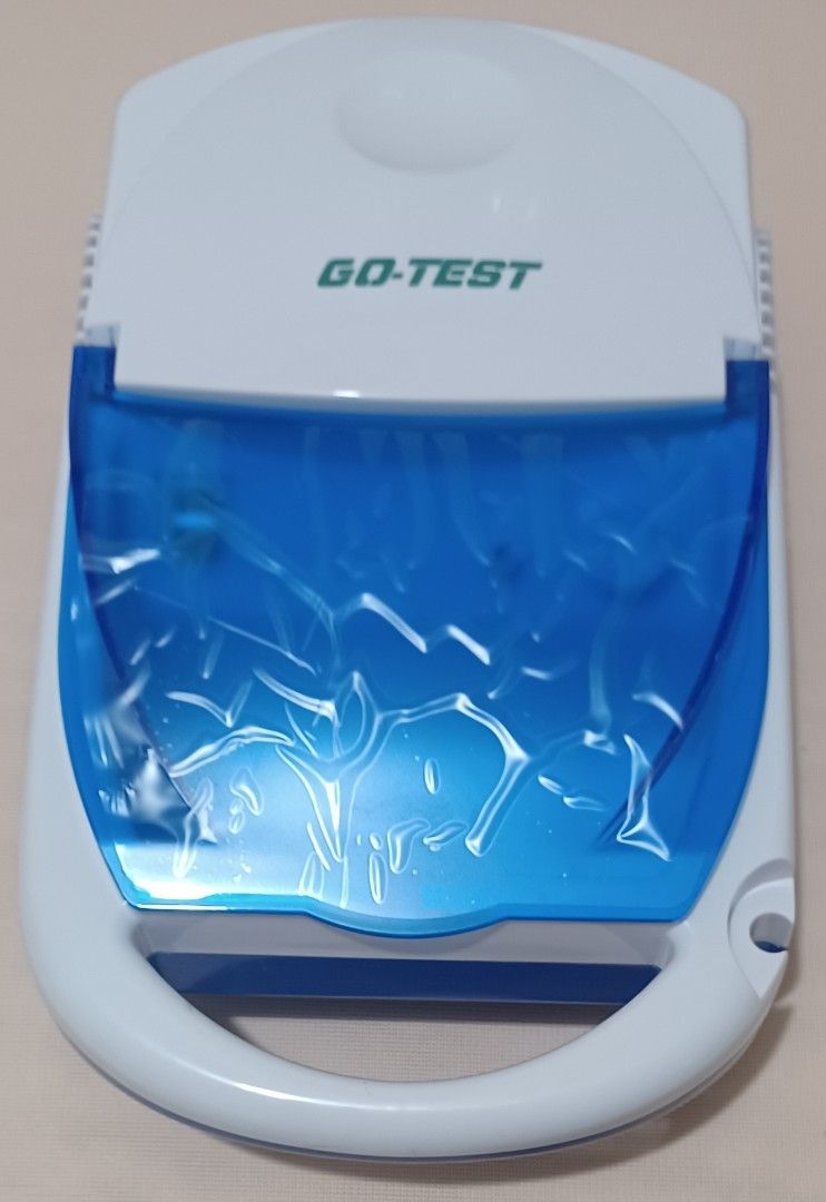 Go-Test Compressor Nebulizer (Category: Medical Supplies & Tools) located in Quezon City. Submitted by wjmae (Listing ID 1439529397, Image 2). Description: - Go-Test Compressor Nebulizer for effective respiratory relief. - Suitable for all ages. - Latex-free design. - Features a blue and white design with a handle. - Includes a power switch and dial. - Comes with the original box..