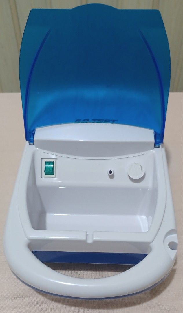 Go-Test Compressor Nebulizer (Category: Medical Supplies & Tools) located in Quezon City. Submitted by wjmae (Listing ID 1439529397, Image 3). Description: - Go-Test Compressor Nebulizer for effective respiratory relief. - Suitable for all ages. - Latex-free design. - Features a blue and white design with a handle. - Includes a power switch and dial. - Comes with the original box..