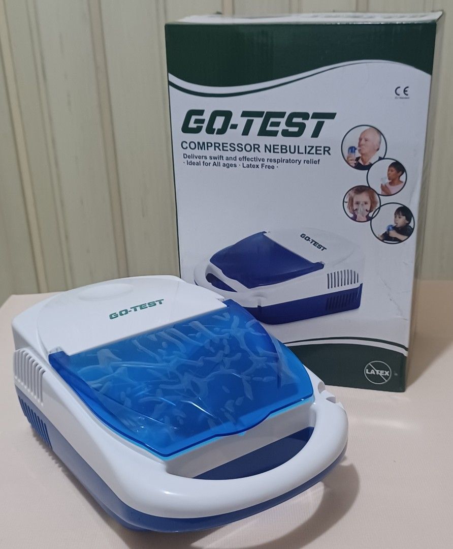 Go-Test Compressor Nebulizer (Category: Medical Supplies & Tools) located in Quezon City. Submitted by wjmae (Listing ID 1439529397, Image 1). Description: - Go-Test Compressor Nebulizer for effective respiratory relief. - Suitable for all ages. - Latex-free design. - Features a blue and white design with a handle. - Includes a power switch and dial. - Comes with the original box..