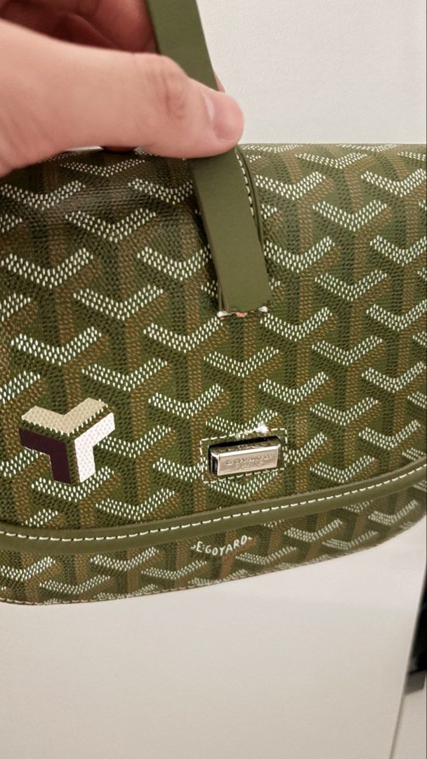 Goyard Saint Sulpice Messenger Bag (Category: Luxury Bags & Wallets) located in Manila. Submitted by rarewhale_9a584c (Listing ID 1439553752, Image 3). Description: - Goyard Saint Sulpice Messenger Bag - Color: Green - Signature Goyardine canvas with white stitching - Silver-tone buckle closure - Interior lined with orange fabric - Adjustable shoulder strap -the strap needs repair.