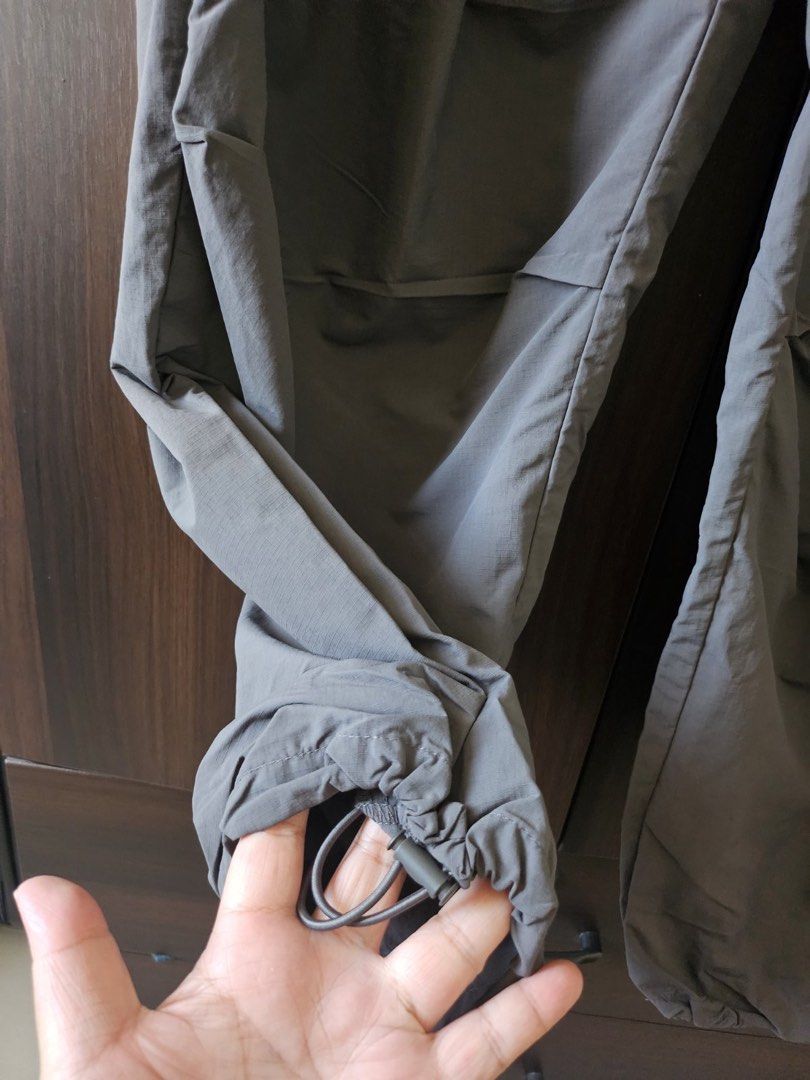 GU Zip Parachute Pants XL (Category: Other Bottoms) located in Makati City. Submitted by stephdzn (Listing ID 1439486800, Image 3). Description: - GU Zip Parachute Pants - Size: XL - Color: Gray - Features: Drawstring hem, zip closure, side pocket - Fit: Relaxed - Condition: Brand new with original tags Waist 34-38.