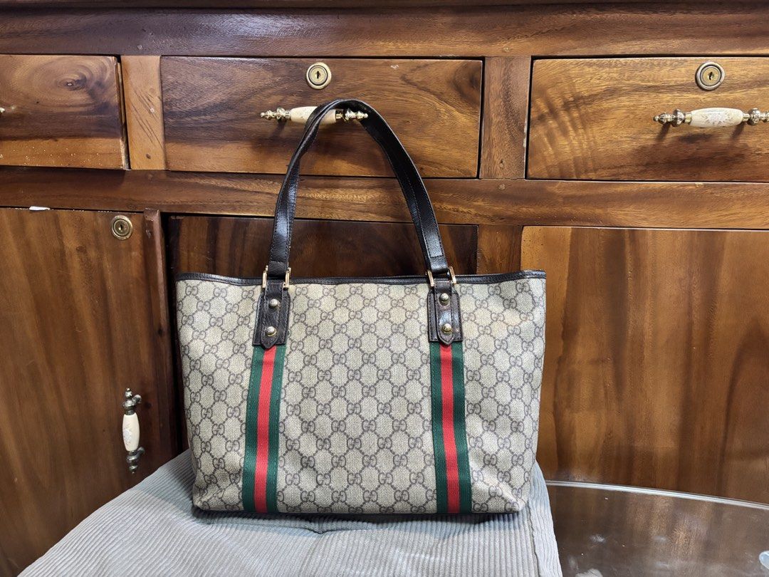 Gucci sherry line tote bag (Category: Luxury Bags & Wallets) located in Imus. Submitted by bagsofblessings24 (Listing ID 1439489880, Image 1). Description: Preloved Gucci sherry line tote bag Medium size Coded Very good condition No rubs on the corners Sign of use is the fading of hardware and crack on strap but still durable Length 11.5in x Height 9.5in x Bottom 4in Guaranteed by source to be original but since this is vintage, should be examine