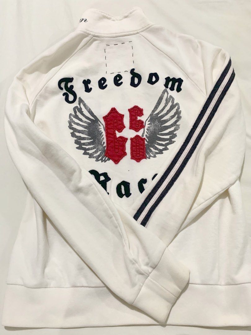 Guess Jeans White Jacket - Large (Category: Coats, Jackets and Outerwear) located in Paranaque City. Submitted by vbvessentials (Listing ID 1439560179, Image 2). Description: - White Guess Jeans jacket - Full zip closure - Front design: "13th Annual CE" - Back graphic: "Freedom Race" - Black and white striped sleeves - Size: Large - Bought in the USA Flaws: some stains but not too obvious.