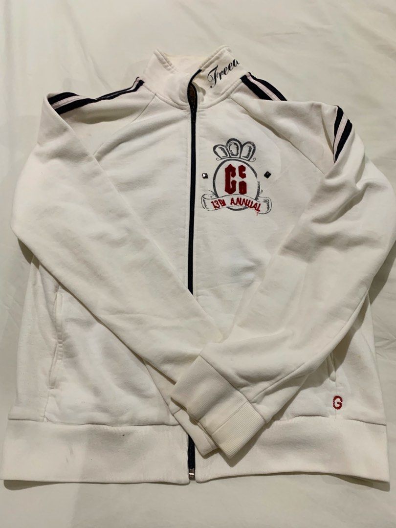Guess Jeans White Jacket - Large (Category: Coats, Jackets and Outerwear) located in Paranaque City. Submitted by vbvessentials (Listing ID 1439560179, Image 1). Description: - White Guess Jeans jacket - Full zip closure - Front design: "13th Annual CE" - Back graphic: "Freedom Race" - Black and white striped sleeves - Size: Large - Bought in the USA Flaws: some stains but not too obvious.